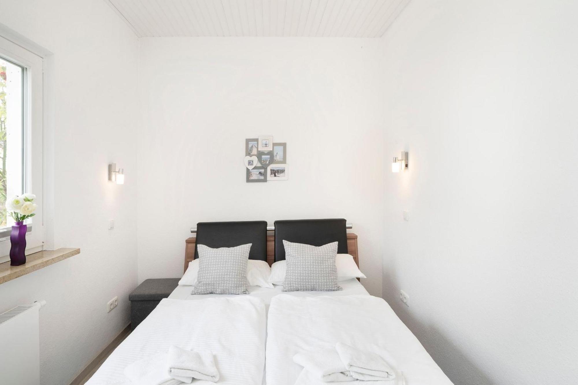 Apartamento Haus Waldfrieden Ferienhaeuschen Waldfrieden Haffkrug Exterior foto