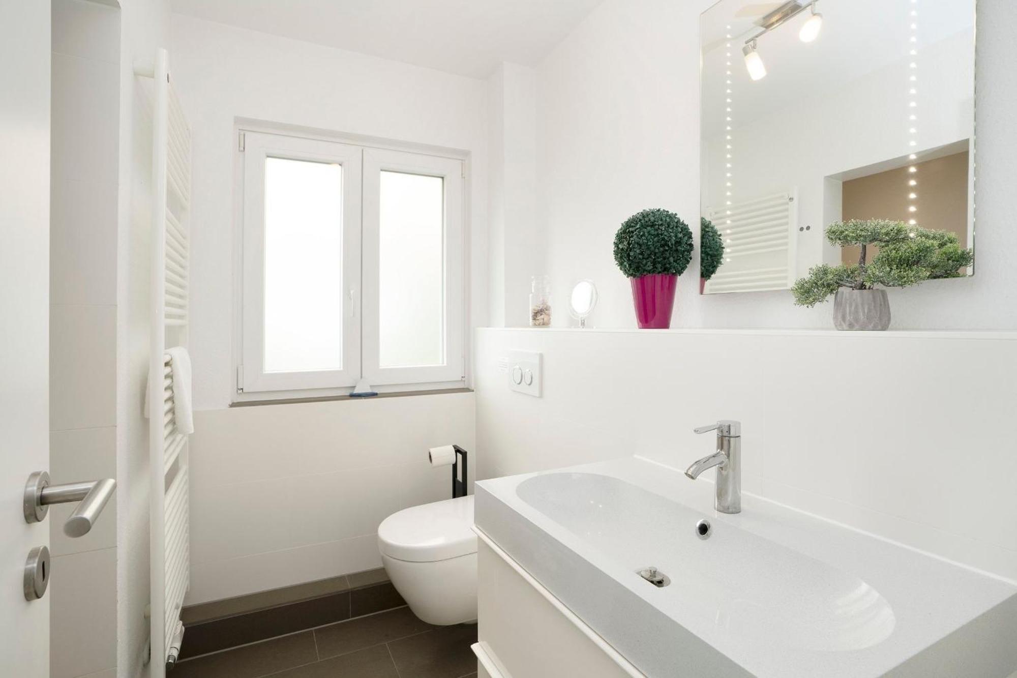 Apartamento Haus Waldfrieden Ferienhaeuschen Waldfrieden Haffkrug Exterior foto
